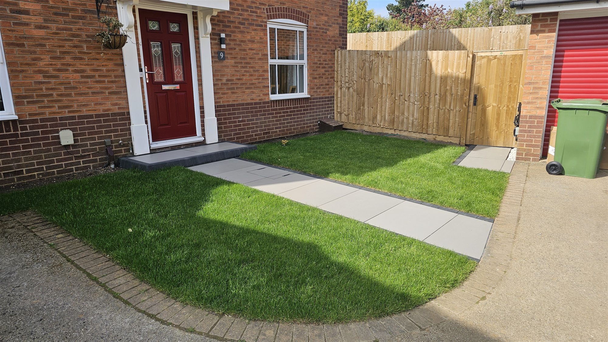 Oakham front garden with porcelain path, step and new turf