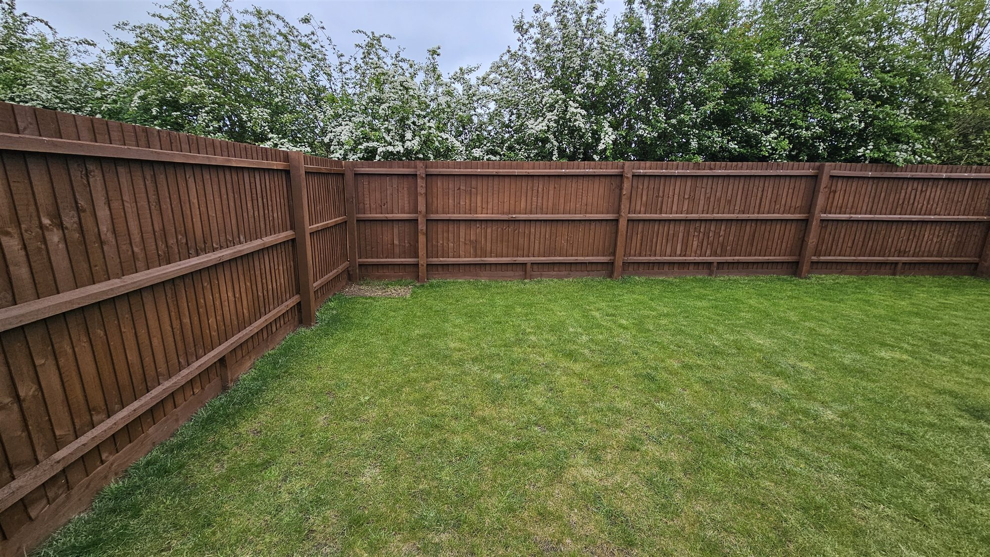 Corby Glen garden before porcelain patio installation