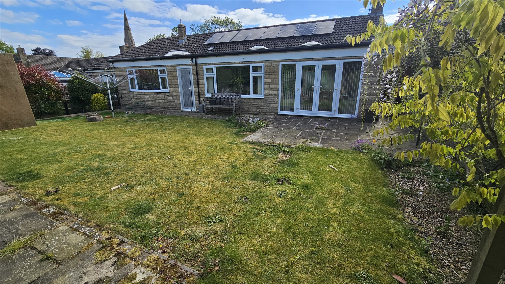 Greetham garden lawn and small patio before transformation