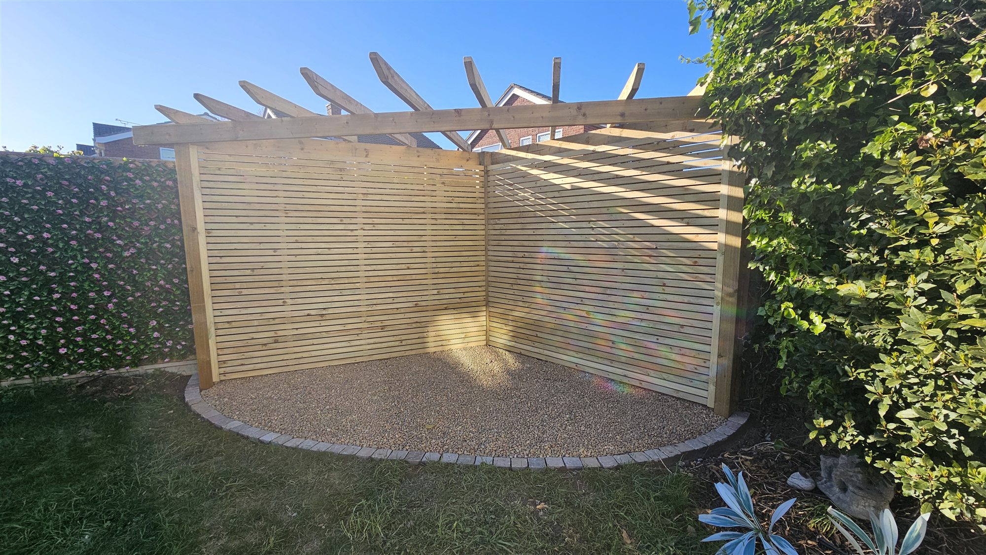 Completed pergola and gravel seating area in Oakham