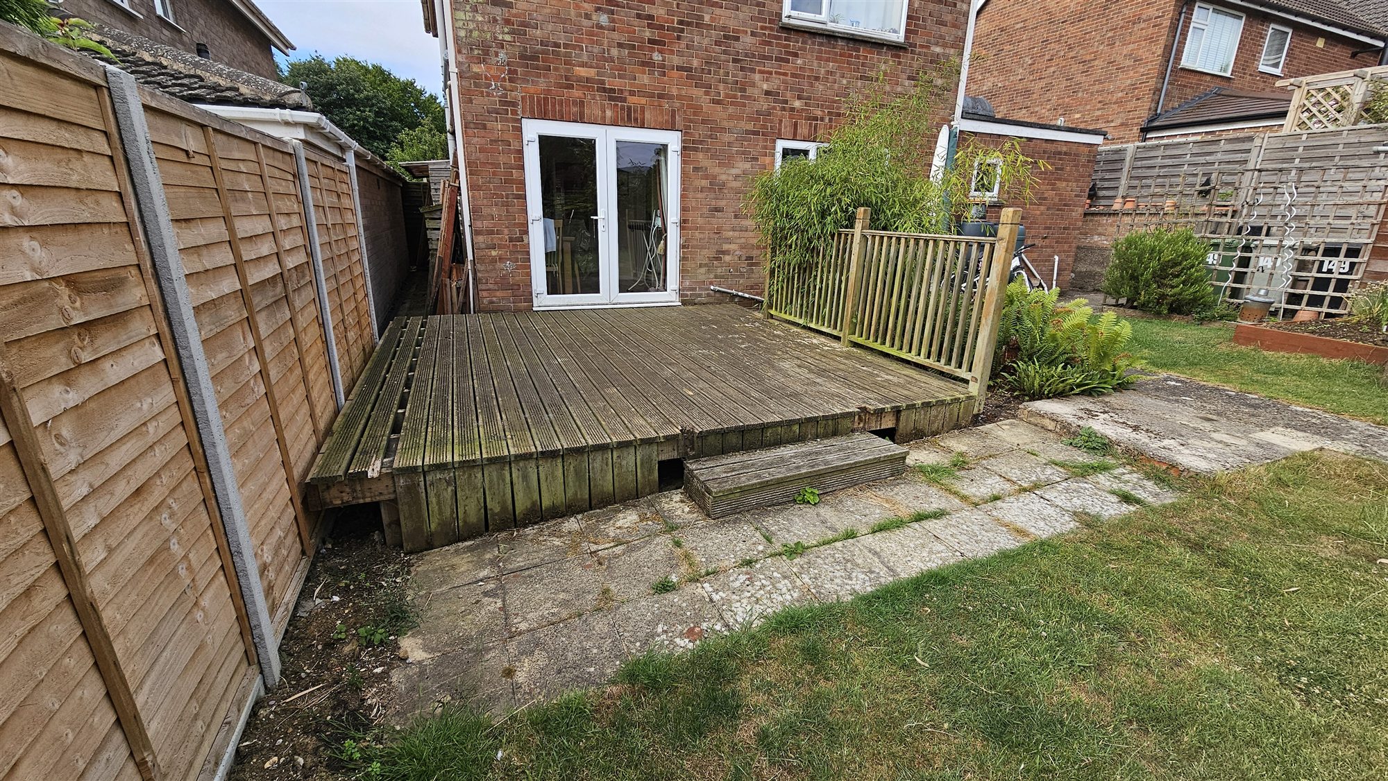 Oakham garden before timber decking replacement